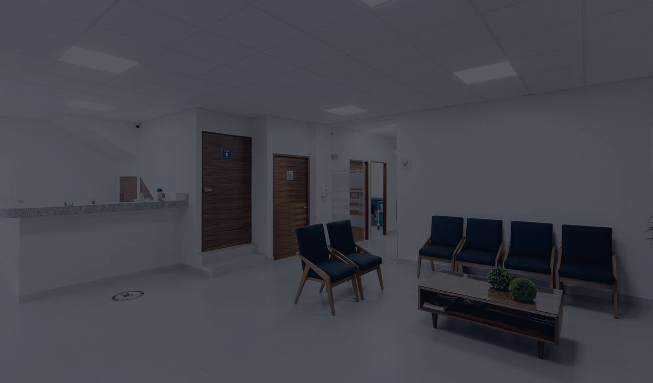 An empty, modern clinic waiting room